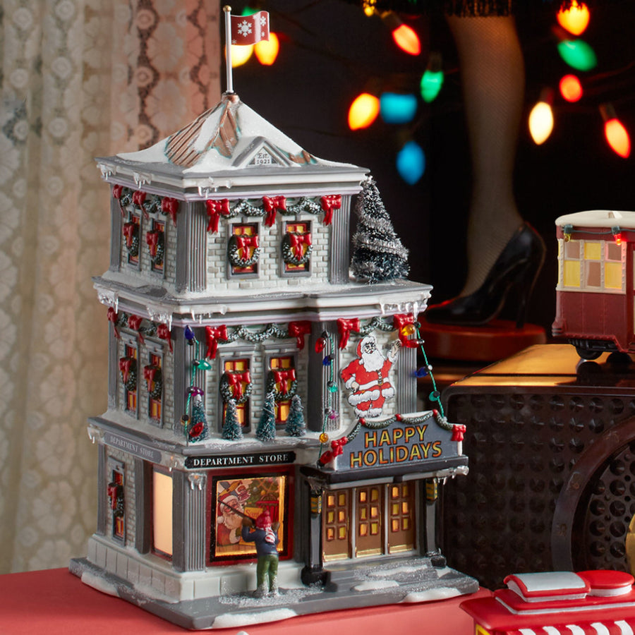 Happy Holidays Department Store from Department 56 A Christmas Story  Village – Red Rider Leg Lamps
